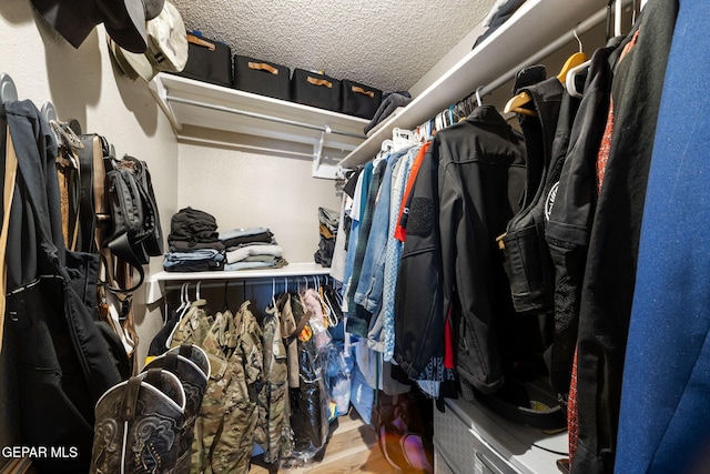 5823 Chippendale Ave, El Paso, TX 79934 - spacious closet featuring wood finished floors