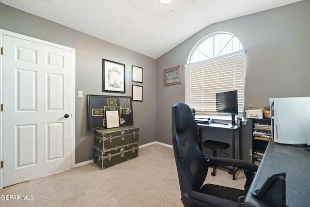5823 Chippendale Ave, El Paso, TX 79934 - office with vaulted ceiling, carpet floors, and a textured ceiling