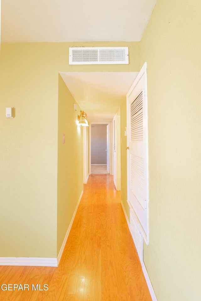 10324 Shoshone St, El Paso, TX 79924 - hallway featuring light wood-style flooring and baseboards