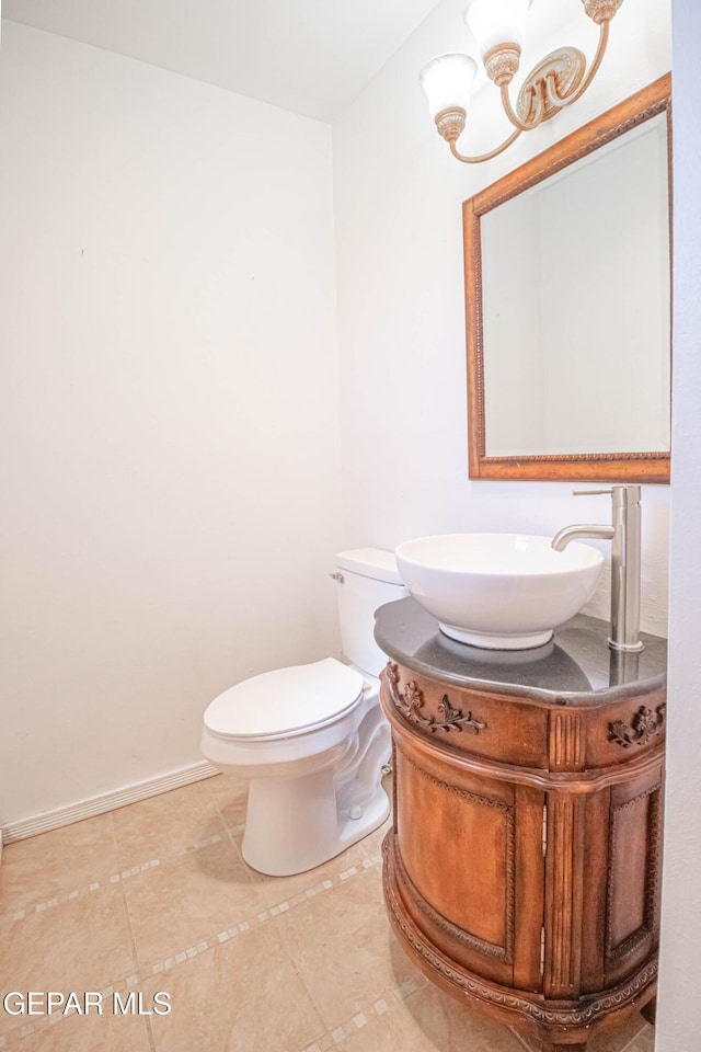 10324 Shoshone St, El Paso, TX 79924 - bathroom featuring vanity, tile patterned floors, and a chandelier