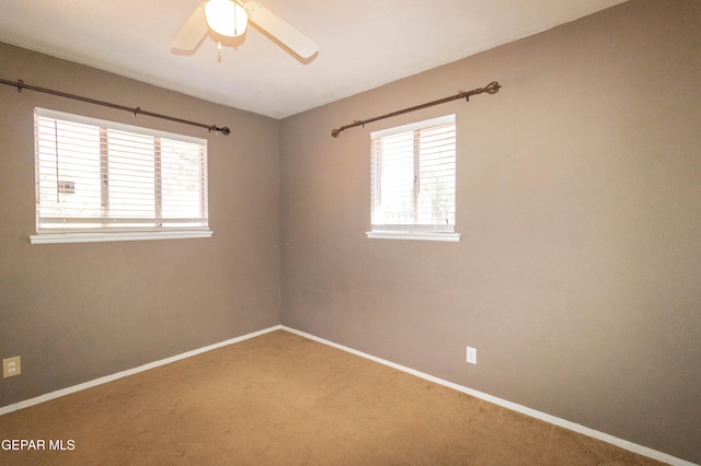 10324 Shoshone St, El Paso, TX 79924 - unfurnished room featuring carpet, healthy amount of natural light, and a ceiling fan
