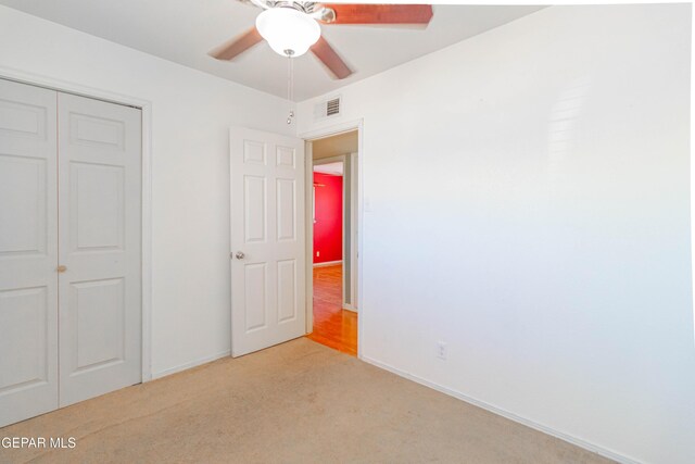 10324 Shoshone St, El Paso, TX 79924 - unfurnished bedroom featuring light colored carpet, a closet, and ceiling fan