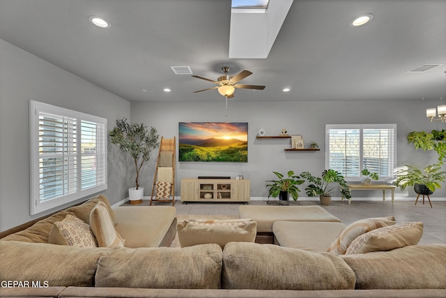 203 Bretby Pl, El Paso, TX 79928 - tiled living room featuring recessed lighting, plenty of natural light, a ceiling fan, and a chandelier