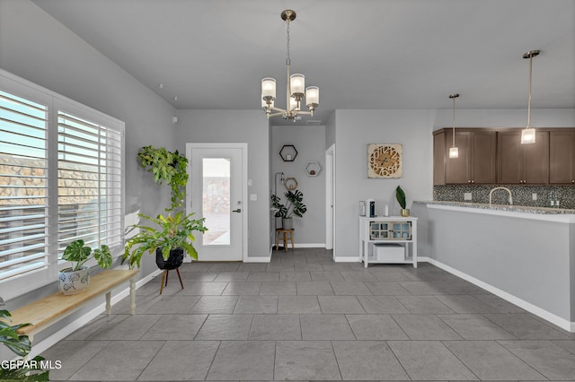 203 Bretby Pl, El Paso, TX 79928 - dining space featuring a chandelier and baseboards