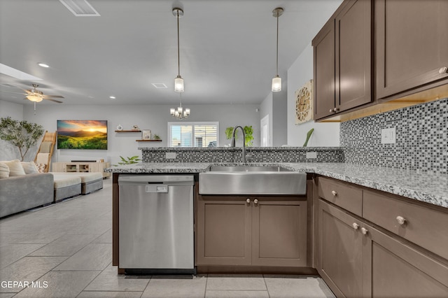 203 Bretby Pl, El Paso, TX 79928 - kitchen featuring stainless steel dishwasher, a peninsula, ceiling fan, backsplash, and open floor plan