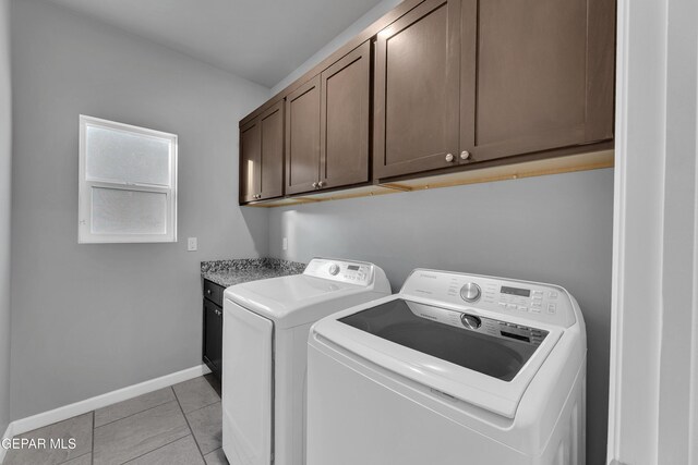 203 Bretby Pl, El Paso, TX 79928 - washroom with cabinet space, separate washer and dryer, and light tile patterned floors
