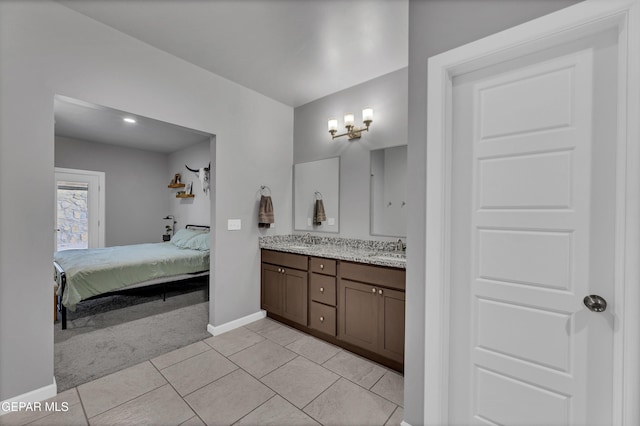 203 Bretby Pl, El Paso, TX 79928 - bathroom with double vanity, ensuite bathroom, and tile patterned flooring