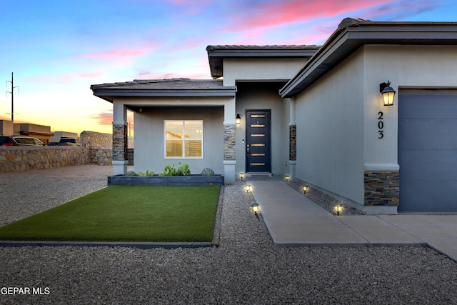 203 Bretby Pl, El Paso, TX 79928 - view of front of home featuring stucco siding and stone siding