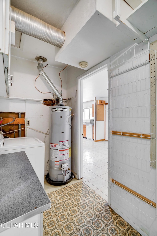10317 Wilshire Dr, El Paso, TX 79924 - utilities featuring gas water heater and washer / clothes dryer