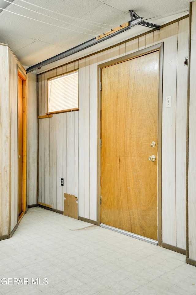 10317 Wilshire Dr, El Paso, TX 79924 - finished below grade area featuring wooden walls and tile patterned floors