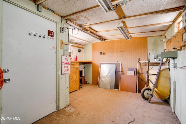 10317 Wilshire Dr, El Paso, TX 79924 - basement featuring a workshop area
