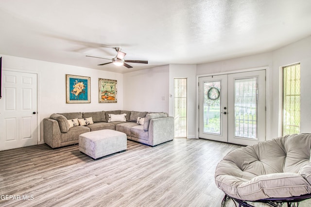 350 Thunderbird Dr Unit 59, El Paso, TX 79912 - living room featuring wood finished floors, a ceiling fan, and french doors