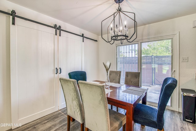 350 Thunderbird Dr Unit 59, El Paso, TX 79912 - dining space with a barn door, dark wood finished floors, and a chandelier