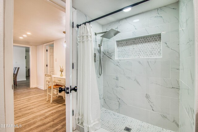 350 Thunderbird Dr Unit 59, El Paso, TX 79912 - full bath with a tile shower, wood finished floors, and recessed lighting