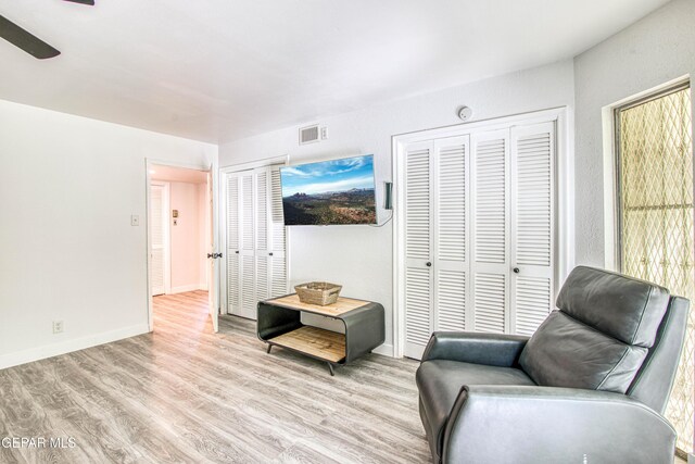 350 Thunderbird Dr Unit 59, El Paso, TX 79912 - living area with wood finished floors and ceiling fan