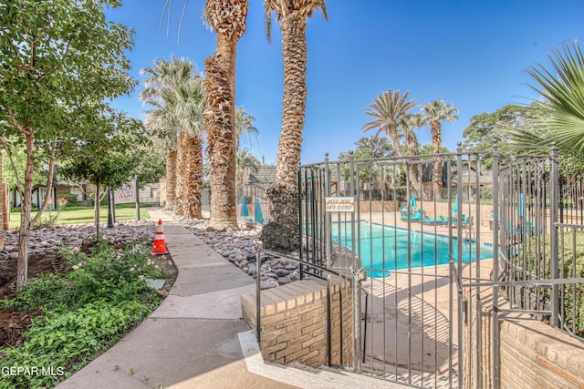 350 Thunderbird Dr Unit 59, El Paso, TX 79912 - community pool featuring a gate