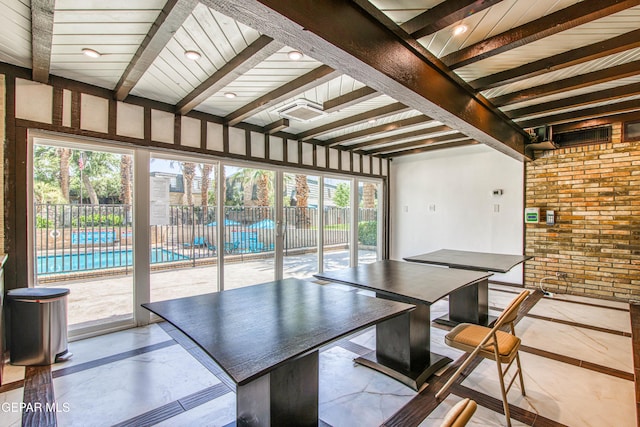350 Thunderbird Dr Unit 59, El Paso, TX 79912 - sunroom / solarium with beamed ceiling, healthy amount of natural light, and inlaid floor details