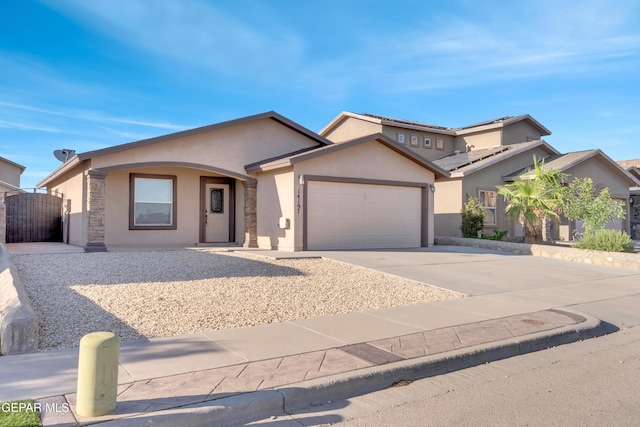 14197 Ranier Point Dr, El Paso, TX 79938 - view of front of property with stucco siding, a garage, and driveway