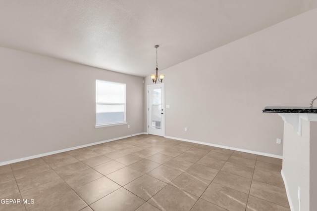 14197 Ranier Point Dr, El Paso, TX 79938 - unfurnished dining area with light tile patterned floors and a chandelier