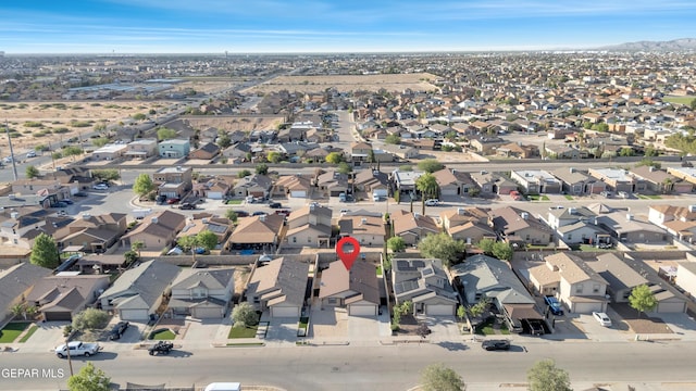 14197 Ranier Point Dr, El Paso, TX 79938 - aerial view of property's location featuring nearby suburban area and a mountainous background