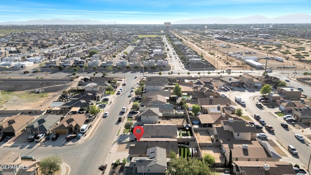 14197 Ranier Point Dr, El Paso, TX 79938 - aerial overview of property's location with a mountain backdrop and nearby suburban area