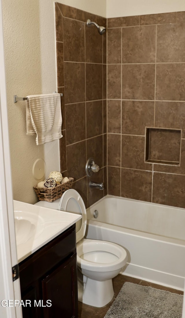 14251 Rattler Point Dr, El Paso, TX 79938 - full bath with tub / shower combination, vanity, a textured wall, and tile patterned flooring
