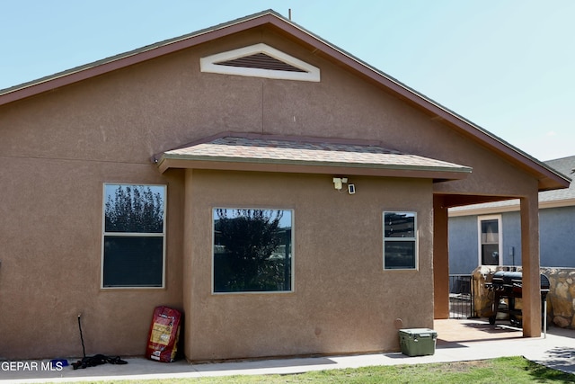 14251 Rattler Point Dr, El Paso, TX 79938 - back of property with a patio area and stucco siding