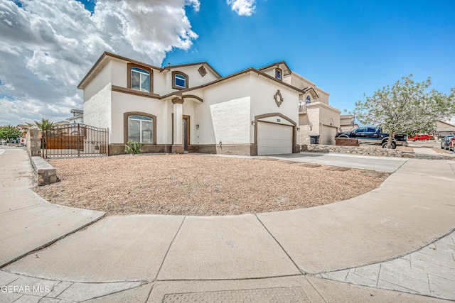 401 Everlook Ln, Horizon City, TX 79928 - view of front of property with a gate, concrete driveway, and stucco siding