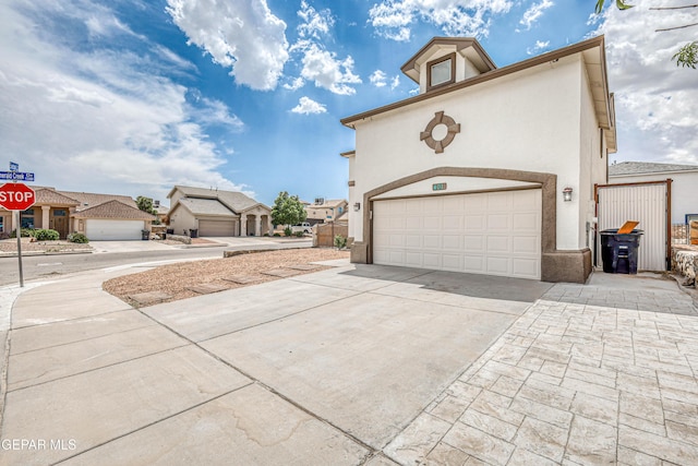 401 Everlook Ln, Horizon City, TX 79928 - view of front facade featuring stucco siding and driveway