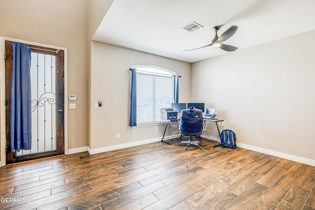 401 Everlook Ln, Horizon City, TX 79928 - office featuring wood finished floors, a ceiling fan, and a textured ceiling