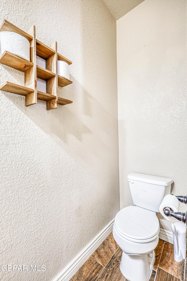 401 Everlook Ln, Horizon City, TX 79928 - bathroom with toilet and wood finished floors