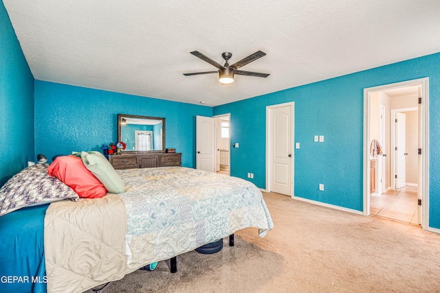 401 Everlook Ln, Horizon City, TX 79928 - bedroom featuring a textured wall, carpet, a ceiling fan, and a textured ceiling
