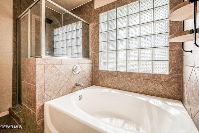 401 Everlook Ln, Horizon City, TX 79928 - bathroom with a bath and a shower stall