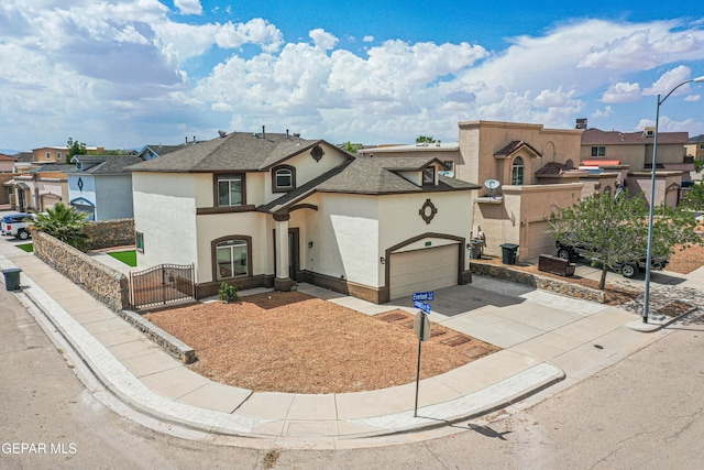 401 Everlook Ln, Horizon City, TX 79928 - view of front of house with concrete driveway, stucco siding, a residential view, and an attached garage