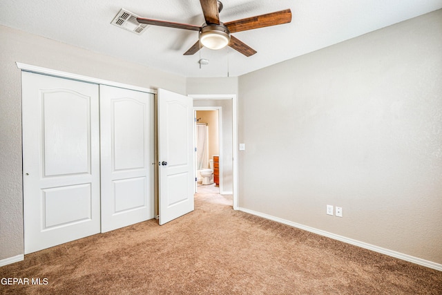 401 Everlook Ln, Horizon City, TX 79928 - unfurnished bedroom featuring light carpet, a closet, and ceiling fan