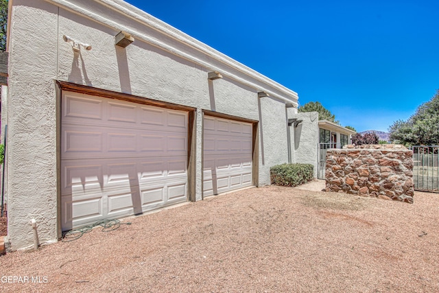 5430 Davis Cup Ct, El Paso, TX 79932 - garage featuring driveway