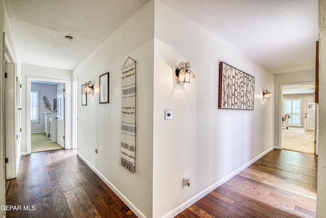 5430 Davis Cup Ct, El Paso, TX 79932 - hall with wood finished floors and a textured ceiling