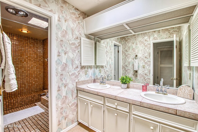 5430 Davis Cup Ct, El Paso, TX 79932 - full bath with wallpapered walls and double vanity