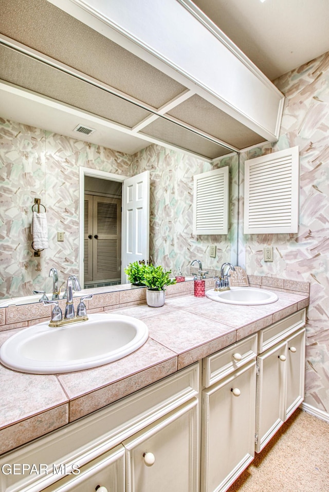 5430 Davis Cup Ct, El Paso, TX 79932 - full bath featuring double vanity and wallpapered walls