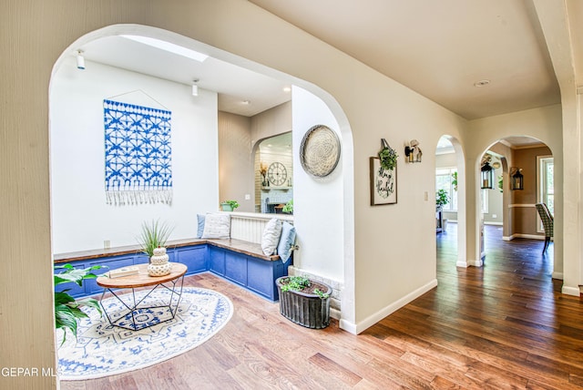 5430 Davis Cup Ct, El Paso, TX 79932 - hallway with wood finished floors, arched walkways, and recessed lighting