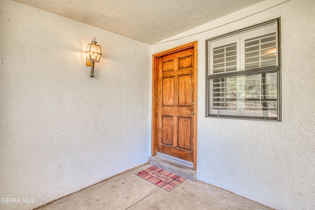 5430 Davis Cup Ct, El Paso, TX 79932 - doorway to property with stucco siding