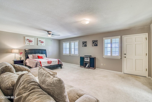 5430 Davis Cup Ct, El Paso, TX 79932 - carpeted bedroom with a textured ceiling and a ceiling fan