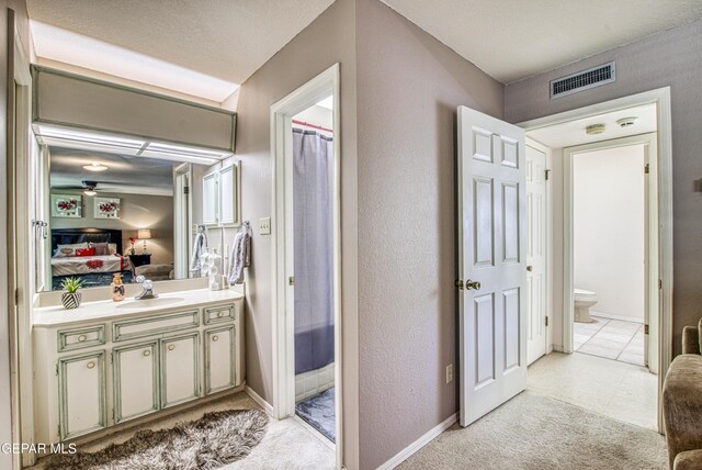 5430 Davis Cup Ct, El Paso, TX 79932 - ensuite bathroom featuring vanity and curtained shower