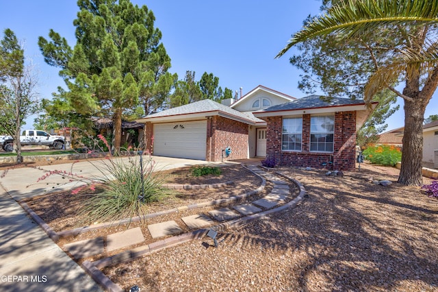 11969 Oak Abbey Ct, El Paso, TX 79936 - single story home with brick siding, driveway, and a garage