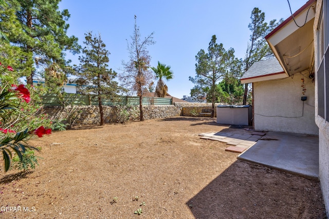11969 Oak Abbey Ct, El Paso, TX 79936 - fenced backyard with a patio