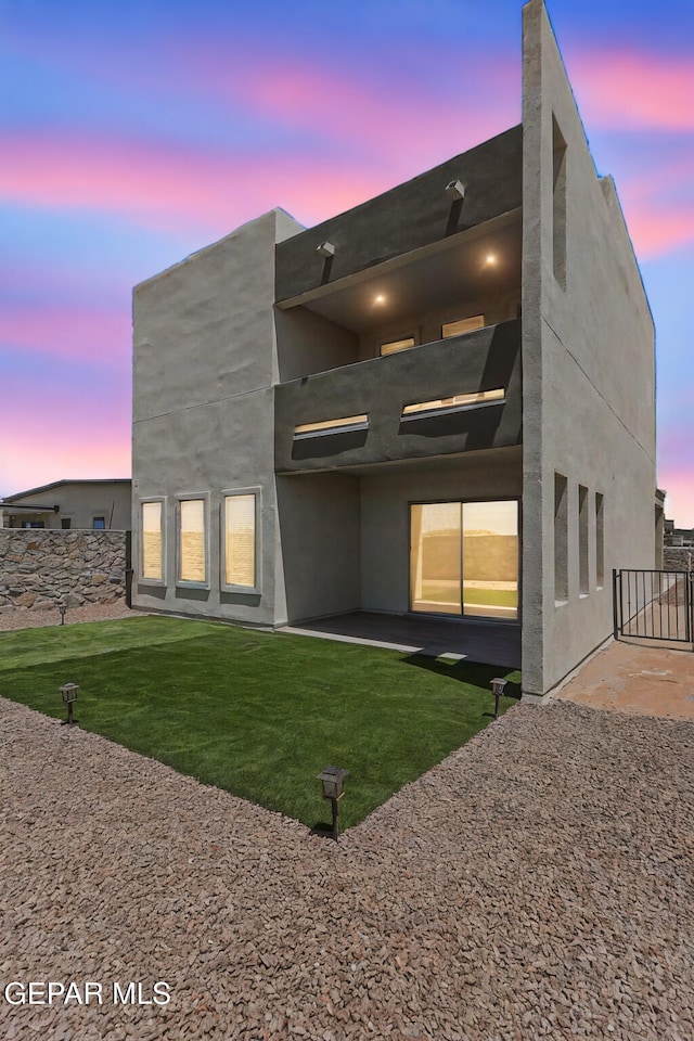 14904 John Mcneely Ave, El Paso, TX 79938 - back of property featuring a balcony and a patio area