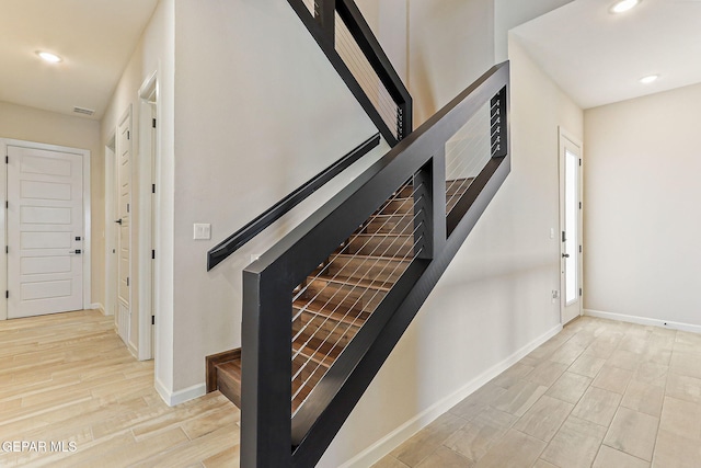14904 John Mcneely Ave, El Paso, TX 79938 - staircase with wood finished floors and recessed lighting
