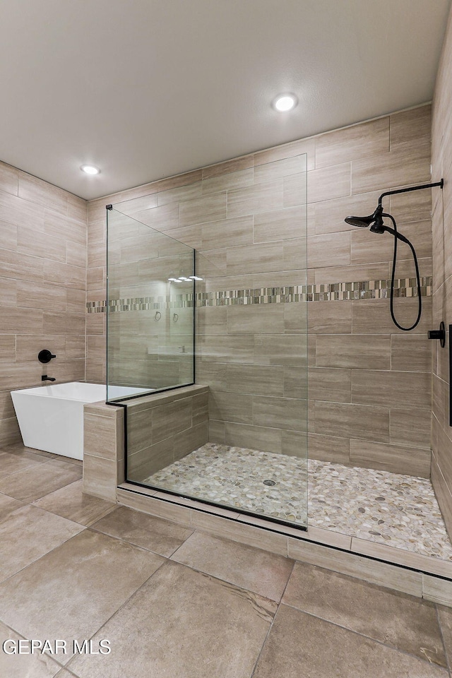 14904 John Mcneely Ave, El Paso, TX 79938 - full bath featuring tiled shower, a soaking tub, tile patterned floors, and recessed lighting