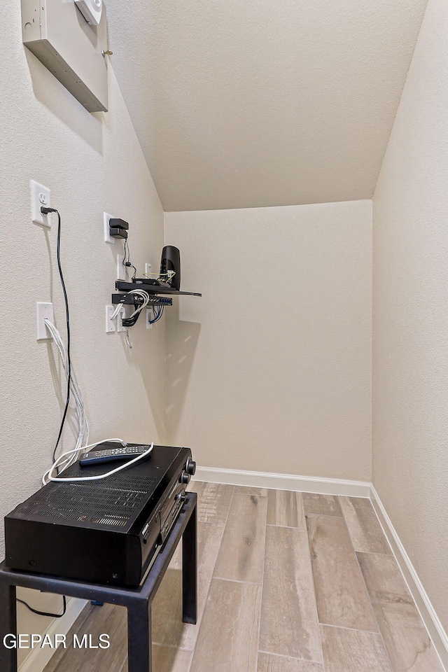 14904 John Mcneely Ave, El Paso, TX 79938 - walk in closet featuring vaulted ceiling and wood finished floors