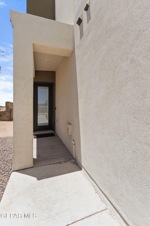 14904 John Mcneely Ave, El Paso, TX 79938 - doorway to property with stucco siding